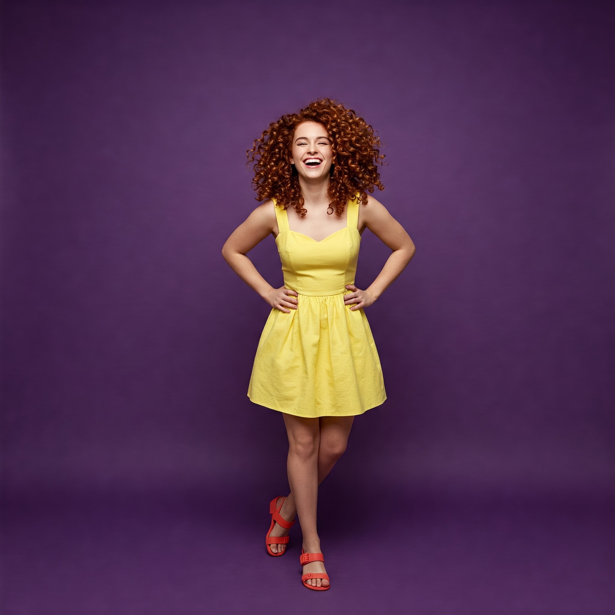 photo of Joyful Woman with Hands on Hips